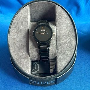 Ladies Citizen Black Stainless and Rose Gold Watch.
